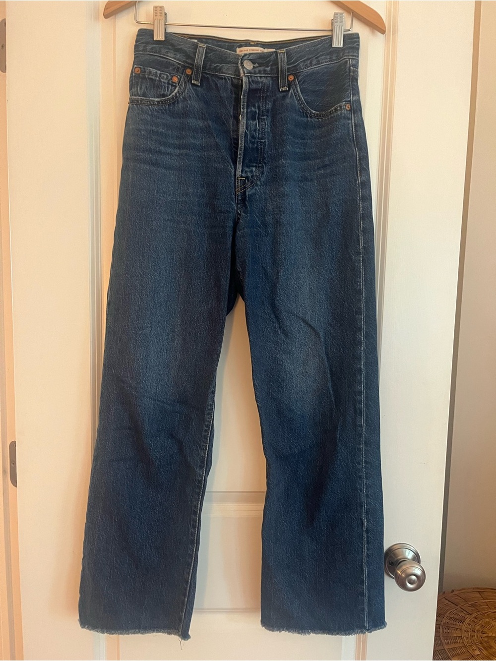 Levi’s ribcage straight ankle dark wash raw hem jeans